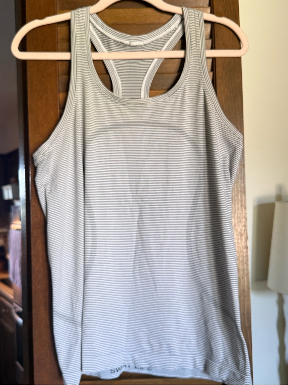 Lululemon Swiftly tank size 10 black and white stripe. Worn once.